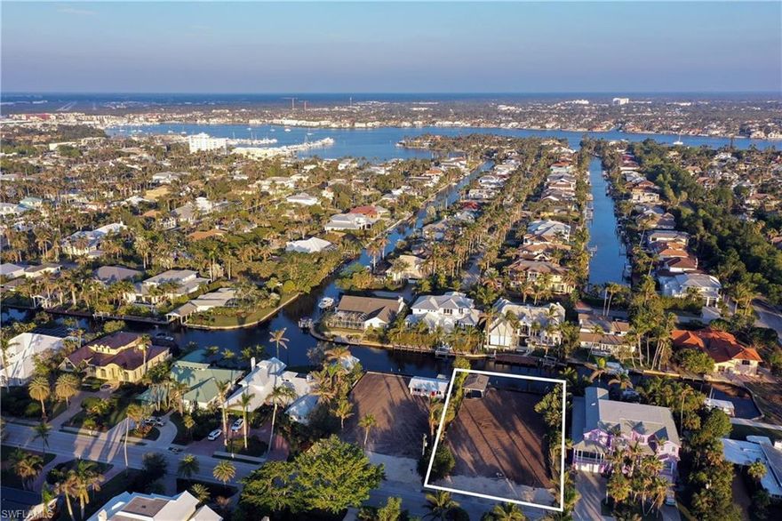!!!WITHOUT A DOUBT THIS IS THE BEST WATERFRONT BUY IN ALL OF NAPLES!!! Check out the SIZE of this DIRECT ACCESS HOMESITE! !!! .38 ACRES !! WITH A "GRANDFATHERED" COVERED BOAT SLIP !! You can walk to Third Street South and the BEACH in minutes!! PLUS, the sellers did it for you: The home has been torn down and you can get a great feel for the breadth and width of this fabulous home site! BUILD YOUR DREAM HOME!!! The most perfect LOCATION LOCATION LOCATION in all of Naples! Situated around the corner from the beach at 18th Avenue South, and a short stroll to all the fine dining options, world-class galleries, amazing shopping, a fantastic farmer's market and so many fun events on the famous Third Street South. Best of all, keep your boat in your own backyard...Did I mention the covered boat slip which creates so much value!?! There are NO bridges to Naples Bay and the Gulf of Mexico! YES, this is the best of ALL worlds! The possibilities are endless. Overlooking Sanderling Cove, the eastern exposure is wonderful.