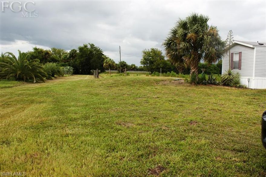 21 ACRES, 2BD/2BA SWMH, 12x12 Storage, Fenced and Cross-fenced, 'some extra dirt left from the current pad...could be used to build your Custom Home in this Neck-of-the-'Woods'. Zoned Residential General.