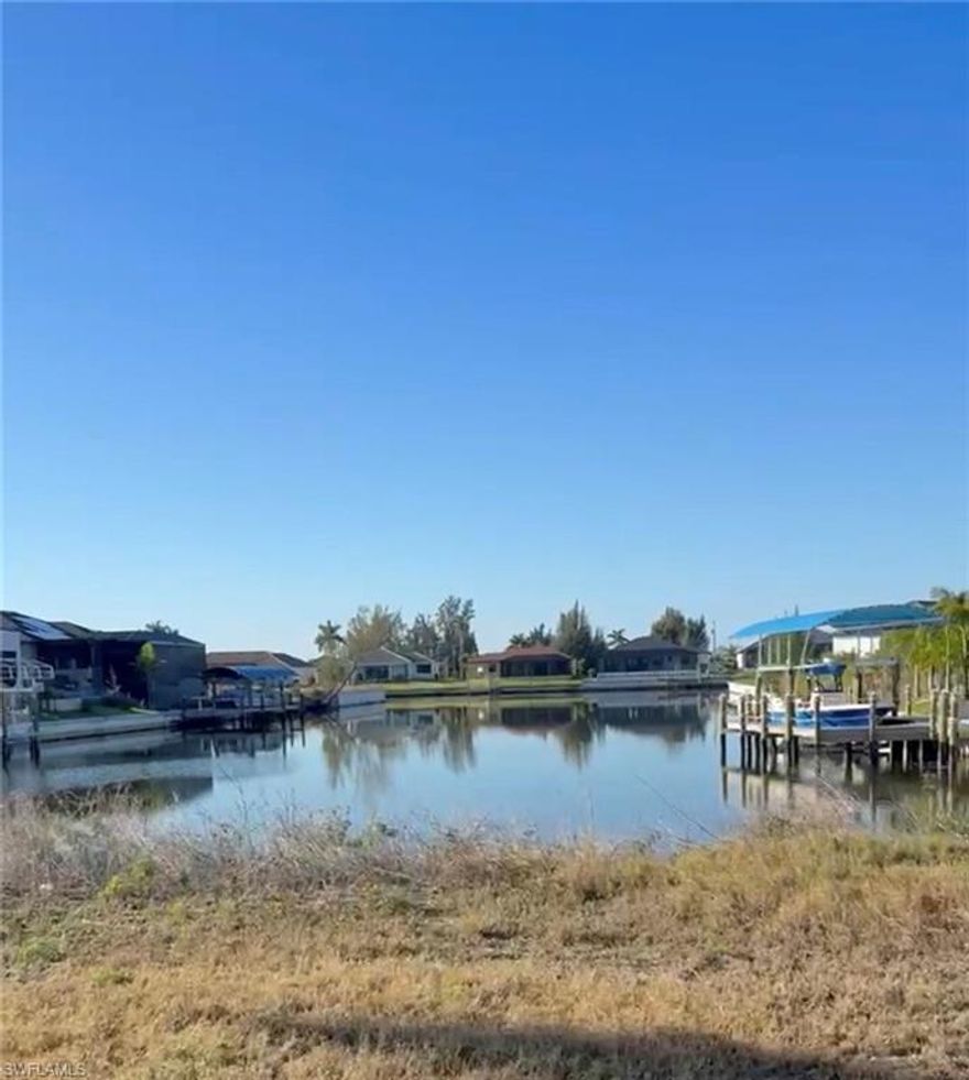 This exceptional, cleared residential lot is the perfect canvas to build your dream home in sunny Southwest Florida. Featuring direct Gulf access and a concrete seawall already in place, you’ll enjoy wide canal views and effortless boating or fishing right from your future dock.   Ideally situated near the highly anticipated Seven Islands development, the area is set to include waterfront dining, retail, a marina, hotel, and more—all accessible by boat. Surrounded by beautiful newer homes, this property offers an ideal blend of privacy, luxury, and convenience.   Don’t miss this incredible opportunity to own a slice of paradise in a rapidly growing and highly desirable location!