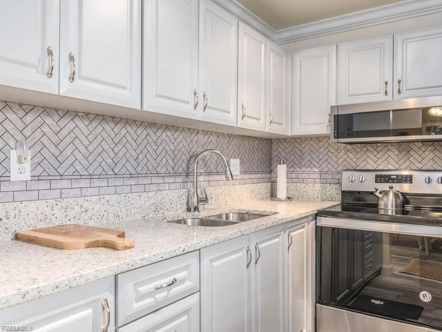 NO AGE RESTRICTIONS IN THIS BUILDING!! Gulf Access Condo in SWFL is a rare find! This elegantly updated and meticulously maintained 2 bedroom and 2 bath unit features a spacious living room and dining area with a spectacular view! Plus, the beautifully landscaped complex offers a heated pool, club house, boat dock(additional fee), storage, and shuffle board courts. You will be within walking distance to Publix, restaurants and shopping. Bring your swimsuit and enjoy the Florida lifestyle you deserve.