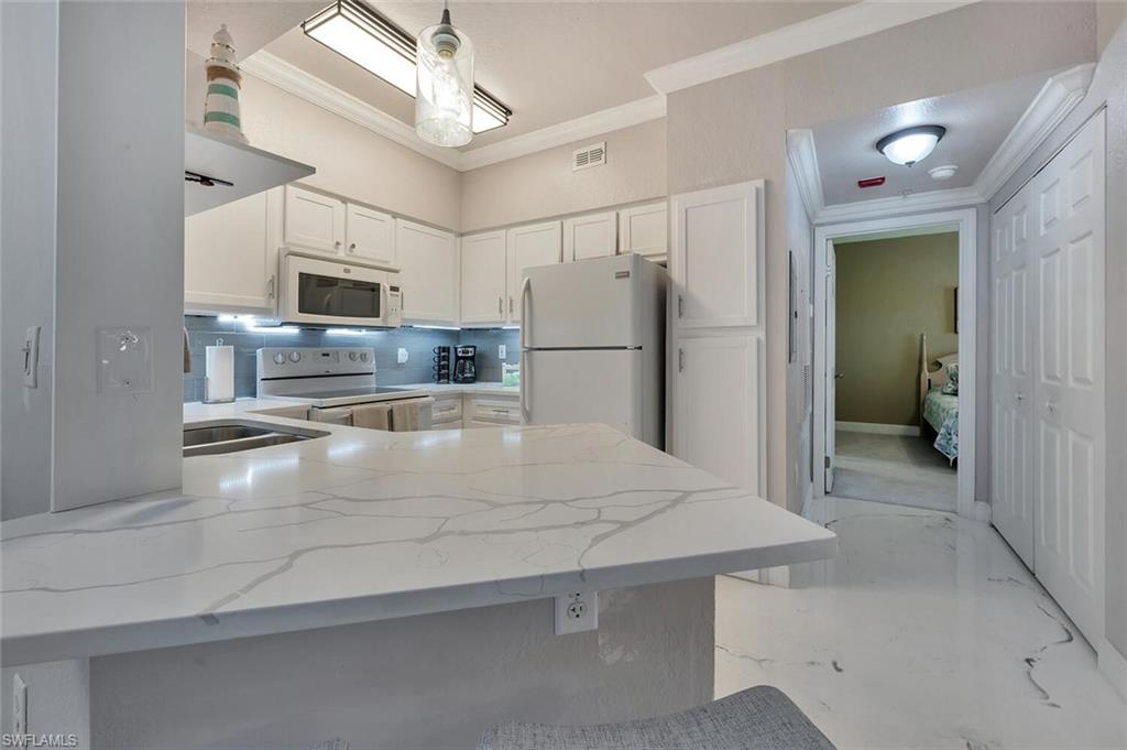 THE TIDES AT PELICAN LANDING - Residential