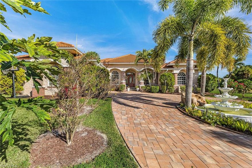 This stunning custom-built 4-bedroom, 3-bathroom pool home sits on a private half-acre lot with serene lake views, tucked away on a quiet cul-de-sac lined with million Dollar homes just minutes from downtown Fort Myers and with quick access to I-75. Designed with spacious living in mind, the home features soaring ceilings up to 15 feet, 7-foot interior doors, an oversized primary suite, and a spacious great room that flows seamlessly into the kitchen featuring granite countertops, beautiful mahogany cabinetry, a breakfast bar, and a dedicated eating area, perfect for everyday living and entertaining. The recently rebuilt pool and spa overlook the water and can be enjoyed year-round from the covered Lanai, ideal for relaxing or hosting guests. Additional highlights include a bonus room ideal for a home office, hurricane impact windows and shutters, a new roof (2 years old), two AC units less than 5 years old, and a new water heater. The home also boasts a newly paved circular driveway with a central fountain, a separate large laundry room, and a peaceful setting with no through traffic. This exceptional property combines space, quality construction, modern upgrades, and a prime location— offering Florida living at its best.