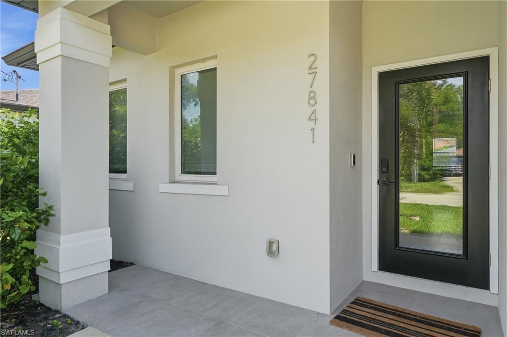 Photo of 27841 Wisconsin ST, BONITA SPRINGS, FL 34135 (MLS # 226027197)