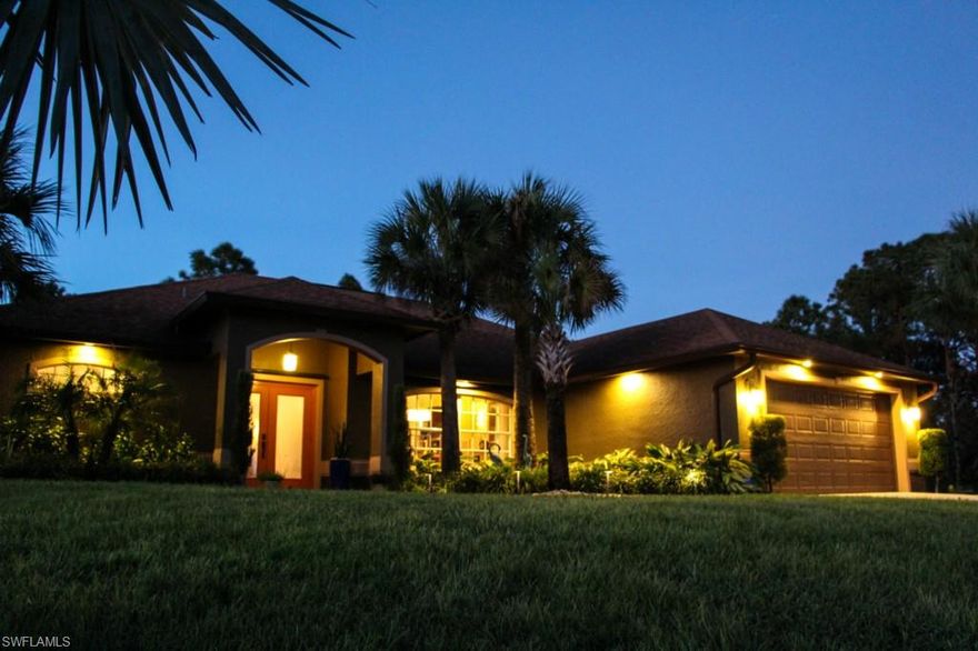 CHECK OUT AERIAL VIDEO 1ST ! Gorgeous! Quiet and secluded home on 3 lot site located off 82 corridor within minutes of shopping.  Outdoor park down the way for all of your outdoor toys! Solar heated black bottom pool with Mansard cage.  This home has too many custom touches to list!