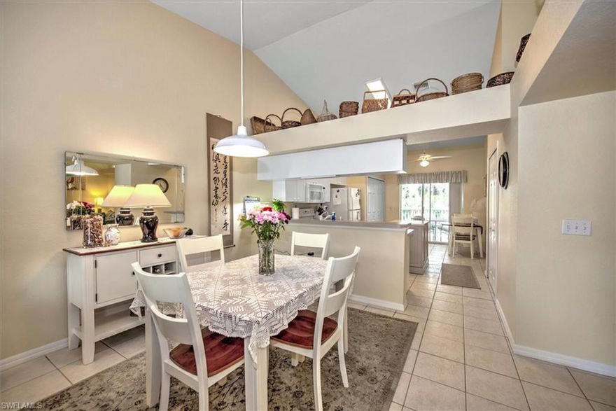 Light and bright unit with 2 bed + Den + 2 bath + Carport features tranquil preserve and creek views! The unit lives large great room living/dining; kitchen with lots of cabinets, island and breakfast area; large living/dining and screened lanai that is accesible from the kitchen and primary suite. The condo features cathedral ceilings, creating an open & spacious atmosphere that enhances the overall aesthetic. Interior colors are neutral and the main living areas have tile flooring. 2nd floor unit means no noisy neighbors above. BRAND NEW ROOF (2025), AC (2021). Enjoy the abundance of wildlife and wading birds from the SW facing screened lanai. Community pool & cabana is a stone's throw away. Residents are also permitted access to enjoy the full amenities at the Villages of Bonita, the adjoining community. Gated front entrance. Bermuda Park is centrally located to local shops, dining and nearby to the sparkling shores of the Gulf of Mexico with access to Lover’s Key State Park, Barefoot Beach, Bonita Beach Park, Fort Myers and Naples beaches.  Seasonal Renter through April 15 2026. FURNISHED AND TURNKEY!