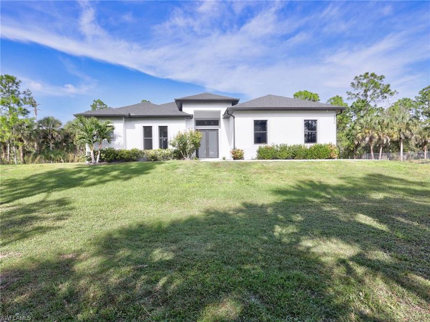 BEAUTIFUL NEW LISTING - 100% UPLANDS!! Move in ready! This beautifully built 3 bedroom + den, 2.5 bath home sits on a 100% upland 2.5-acre lot just off 16th St NE in Golden Gate Estates. Featuring 1,900 sq. ft. living and 2,627 sq. ft. total, this property offers the perfect blend of space, upgrades, and privacy. Enjoy a 2-car garage, 24x24 porcelain tile, crown molding, quartz counter tops, solid wood cabinets, and stainless steel appliances. The living room and primary suite include tray ceilings, while the primary wing offers an over-sized bedroom, two walk in closets, a double vanity, and a glass-enclosed shower.
Outdoor features include a large lanai, beautiful landscaping, automatic sprinkler system, and impact-resistant windows and doors. The backyard is newly fenced with black chain link fence. This house is a fantastic value in a prime Estates location close to the new expansion of Vanderbilt opening soon.
*Don't miss out on the virtual tour*