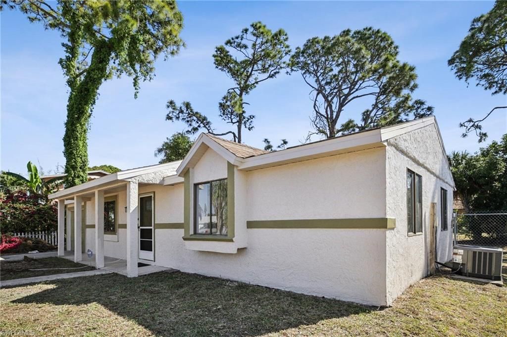 Photo of 17413 Lee RD, FORT MYERS, FL 33967 (MLS # 226013333)