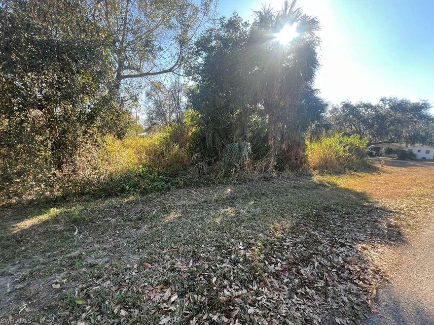 Oversized residential vacant lot located in the growing Fort Myers Shores area. This irregular corner/expanded parcel offers approximately 0.43 acres, providing ample space for new residential construction or investment development. Property offers convenient road access and is situated within an established neighborhood with nearby residential homes.Ideal opportunity for builders, investors, or end-users looking to construct a custom residence. Area continues to see steady growth and redevelopment activity. Lot size allows flexible design options subject to county zoning and building regulations.