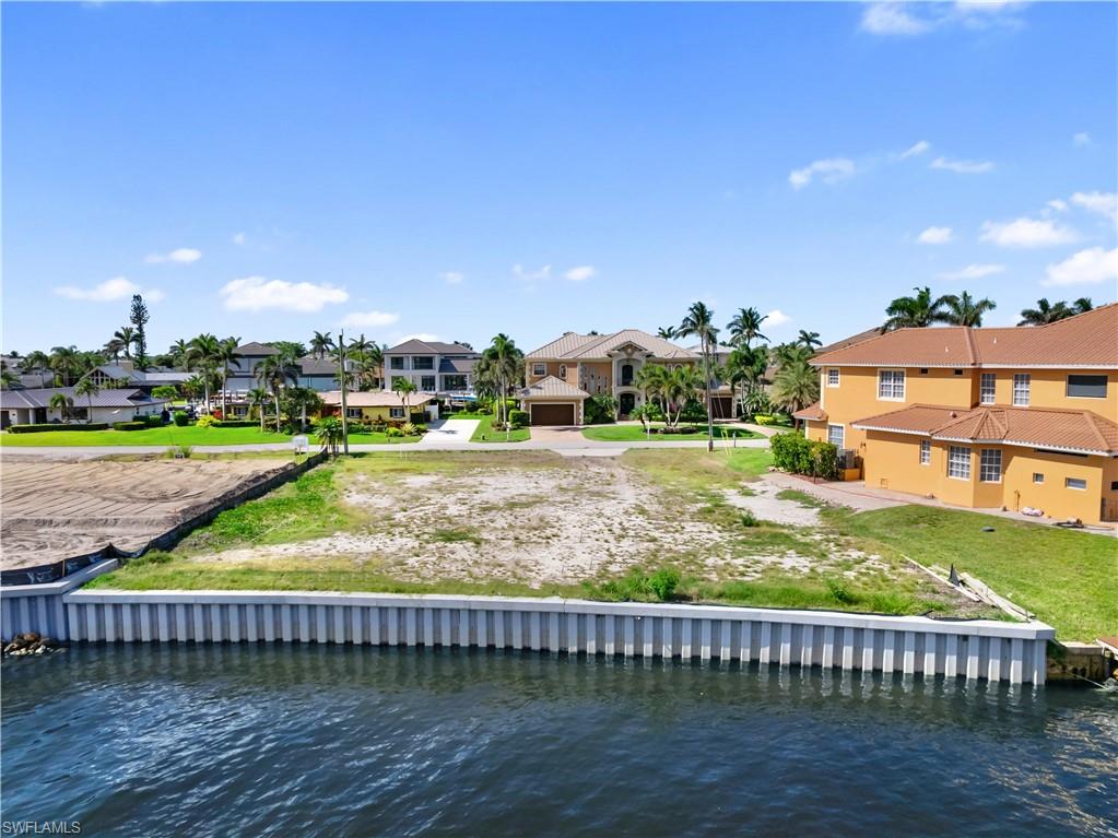 TOWN AND RIVER - Land