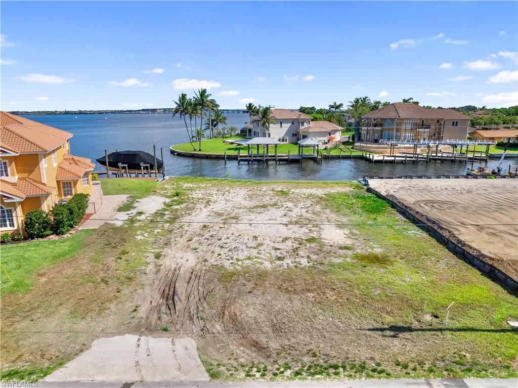 TOWN AND RIVER - Land