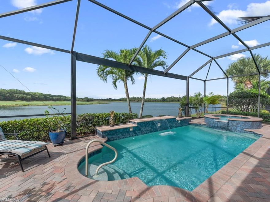 Furniture package sold for $30,000. Move-in ready with exquisite detail. Former model home in Porto Romano at Miromar Lakes Beach & Golf Club. The  3  bedroom plus den,  2  ½  bath  home  is  designer  furnished  with  organic  textures  and  patterns  with  clean  transitional  lines  and  finishes.  Subtle  earth  tones  create  a  soothing  palette  combined  with  rich  woods.  The  great  room design affords the homeowner wide water views and is the perfect  floor-plan to seamlessly  blend  indoor living  with an outdoor Florida lifestyle complete with outdoor kitchen, large pool and integrated spa in a spacious screen lanai overlooking the lake and rolling fairway. This home is a must-see for the buyer looking for up-to-date finishes and impressive ceiling treatments and wall details. Granite countertops, stainless appliances, walk-in pantry, wine cooler, bar and large center island complete the kitchen. Miromar Lakes features 700 acres of lakes, boating, fishing, swimming, water skiing, 3 miles of beaches, beach grill, club house, pool, full service spa, fitness center, equity golf, tennis and many other award-winning amenities.