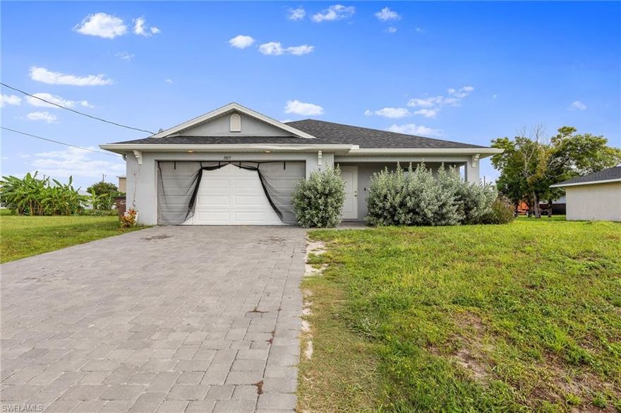 Welcome to this charming and versatile home in a great Cape Coral location. Built in 2022 on a spacious .23-acre lot, this 1,617 sq ft property offers the perfect blend of modern comfort and prime convenience. The open floor plan features 3 bedrooms and 2 bathrooms, with neutral toned tile flooring flowing throughout the main living areas. The kitchen is a true highlight, boasting white cabinetry, granite countertops, and stainless steel appliances. A dining area provides seamless access to the covered back patio with pavers, while the private backyard offers
plenty of room to add a pool. Located in one of Cape Coral's fastest-growing neighborhoods, this home is just minutes from local stores, shopping, and dining, with easy access to major roads and amenities.