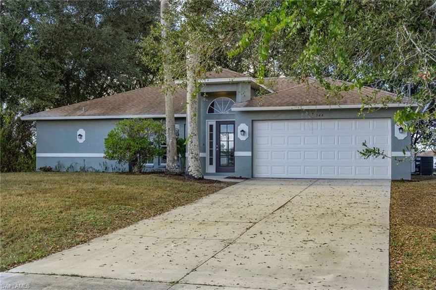 Welcome home to this beautifully renovated 3-bedroom, 2-bath retreat, featuring a 2022 roof, 2019 AC, and set on an oversized lot with peaceful canal frontage—priced to sell. Tucked into a quiet neighborhood, this home offers the perfect balance of space, comfort, and easy Florida living.
Step inside to an open, light-filled floor plan with generously sized rooms, fresh interior and exterior paint, and stylish new LVP flooring throughout. The bright open-concept living area flows seamlessly into the kitchen and dining space—ideal for everyday living and entertaining—while large sliding glass doors fill the home with natural light and create an effortless indoor-outdoor connection.

A screened-in lanai extends your living space outdoors, perfect for morning coffee, evening relaxation, or hosting friends year-round. A two-car garage and thoughtful updates throughout add everyday convenience and peace of mind.

With no HOA, located outside of any flood zone, and featuring quality renovations, this home is well-suited for VA and FHA buyers seeking a truly move-in-ready property. Enjoy easy access to Immokalee and Fort Myers, RSW International Airport, MLB Spring Training facilities, beautiful Gulf Coast beaches, shopping, dining, churches, entertainment, and more.