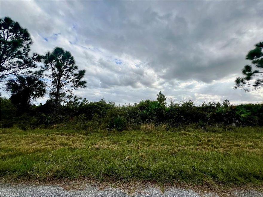 Located in a developing neighborhood, this residential lot features easy access to main roads, utilities nearby, and proximity to local amenities