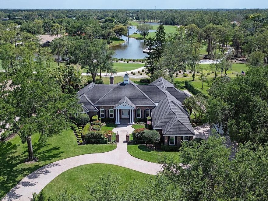 NO WAITLIST FOR GOLF! Perched along Quail Creek's meticulously maintained greens and behind its private gates, this sprawling, recently renovated residence offers timeless appeal and modern luxury while offering an unmatched level of amenities and world-renowned golf. The transitional residence spans across almost 5,000 sq. ft. of living space and offers a total of four-bedroom suites, one of which is a luxurious master suite complete with sitting room, fireplace, and sauna; four full bathrooms and one-half bathroom, library / study, as well as a truly gourmet kitchen and adjacent bar equipped with top-of-the-line appliances. A circular brick pavered driveway leads the way to a quaint private garden that envelopes the home's double door entry. Step inside to soaring ceilings, rich millwork, herringbone floors, and walls of French doors overlooking a resort-style pool and spa. Considered the heart of the home, a truly gourmet kitchen featuring a custom-built, expansive burled wood island with dual dishwashers, sinks, and disposals, make it an ideal space for cooking, baking, and entertaining. The well-designed kitchen also includes ample countertop and storage space, with a built-in pantry, and top-of-the-line Thermador appliances, including a 48-inch gas range, two side-by-side refrigerators and freezers, built-in oven, warming drawer, and a microwave/convection oven. Directly adjacent, a custom bar/coffee station is equipped with an ice maker, beverage cooler, wine fridge, and Miele coffee system. The master suite serves as a true sanctuary, with a spa-inspired bathroom that includes a large sauna, dual vanities, a standalone tub, an oversized, zero-entry glass shower with body jets, multiple adjustable shower heads, and a hand-held body spray. The suite's dressing room, a true masterpiece, offers a large center island surrounded by mirrored cabinetry, providing ample space for both him and her. The expansive 2,800 sq. ft. exterior living terrace was crafted out of shell stone decking and creates the perfect space for entertaining around the stunning saltwater pool and spa - all while enjoying panoramic golf-course views.  Additional features that make this an incredible value include new impact-resistant doors, windows, and garage doors, as well as a stand-out, climate-controlled 288-bottle wine display, and much more. Quail Creek is known for its two Arthur Hills designed 18-hole golf courses, as well as its recently renovated club house that offers multiple options for members to enjoy not only golf, but tennis, pickle-ball, and bocce ball programs, as well as spa services, a Blue Zone fitness center, additional social groups, clubs, activities, and two fabulous dining options.