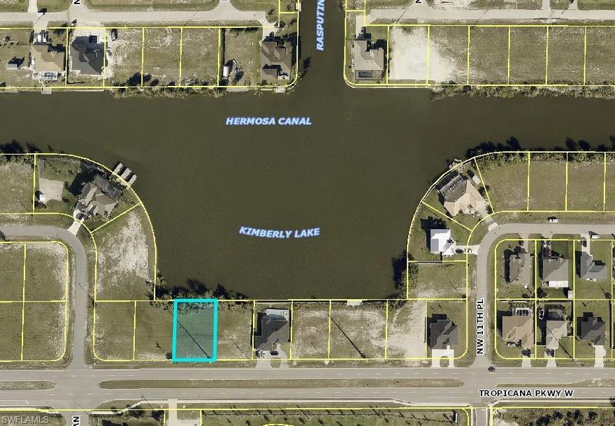 Lake Lot with Amazing Views!!! This Freshwater lot is located on Kimberly Lake, with City Water, Sewer, and Irrigation already installed. This oversized parcel has apprx 85ft of waterfront, perfect for your new Florida dream home with amazing views across the 450ft wide Lake!! This lot is located in a neighborhood of newer homes and is perfect to buy for an investment or build your new home. The canal leads to many miles of boating and fishing! Also, the lot is centrally located in Cape Coral, very close to the Pine Island Shopping Corridor, Publix, Target, Starbucks, and many other shops and restaurants! Lets is a great lot and won't last long.
