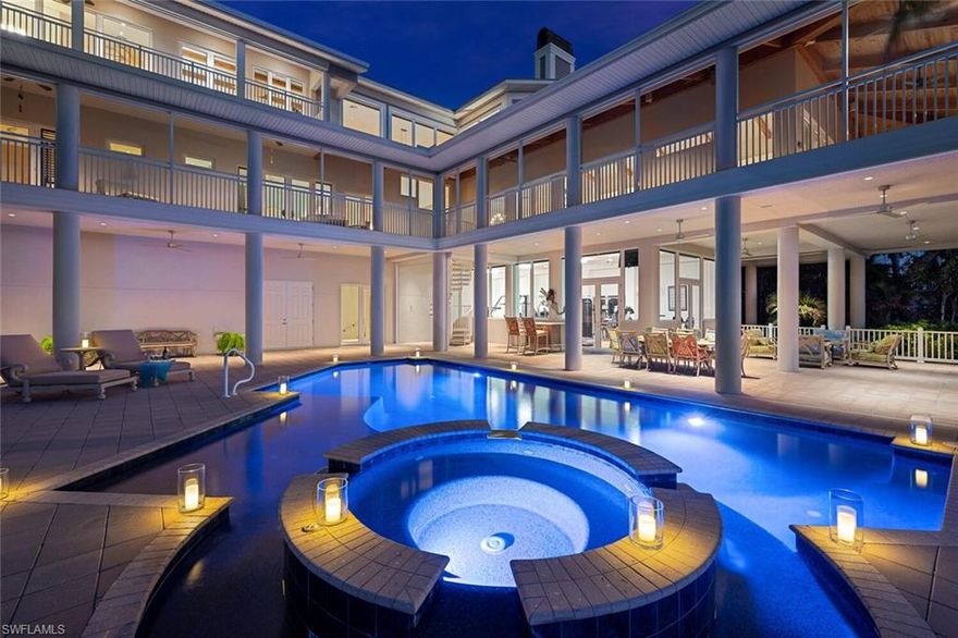 H2881. In an area known for multi-million-dollar homes, this private, gated, built in 2007, family compound on the Gulf is a one-of-a-kind standout, with 5 bedrooms, 5.5 bathrooms and almost 15,000 square feet of indoor/outdoor living space on South Ft Myers Beach. Complete with a custom pool and spa, this magnificent beach retreat is enviably situated on 0.88 acres at the south end of Estero Island offering a rare ownership opportunity to those who treasure privacy and appreciate luxury. In addition to spectacular Gulf views from almost every room, the home’s resort-style amenities and lavish custom appointments place it in a class by itself. While the home’s impressive square footage is designed to flow seamlessly from room to room and from indoors to outdoors, each perfectly planned space has a distinct personality. The L-shaped floor plan is similarly thoughtful. Almost every room opens to one of the home’s expansive screened porches that not only provide sweeping views of the sand and surf, but also facilitates abundant natural light and Gulf breezes. This luxury compound retreat is the ideal place to unwind and enjoy all the best that Southwest Florida has to offer!