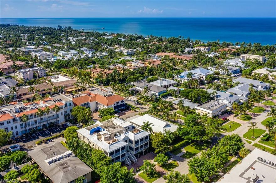 Highly sought-after Rooftops on Fourth, an exclusive and luxury downtown condominium residence with a location that could not be more perfect. Rarely available, this exquisite, nearly 5,000 Sq. Ft. penthouse residence boasts a stunning interior design and a private 3-car under-building garage. It is the only residence including a den and additional highlights include gorgeous flooring, a beautiful kitchen with luxury appliances, a dining and living area with custom lighting and tray ceilings and a light and bright den with custom built-in cabinetry. A wall of glass doors leads to a spacious outdoor lanai. Two en-suite guest bedrooms and a spacious master suite offer exceptional luxury. An interior elevator reaches the 838 Sq. Ft. private rooftop terrace with a summer kitchen and a stunning skyline view of downtown Naples and the Gulf, making it a fabulous space for entertaining and watching magnificent sunsets. The location of Rooftops is ideal, around the corner from 5th Avenue S and a short stroll to the beach.