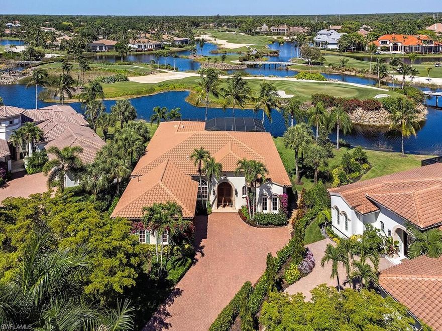 Welcome to Resort Style Living,Welcome to Grey Oaks! IMMEDIATE GOLF MEMBERSHIP available. From the moment you walk in the front door, the expansive golf and water views will captivate you. This beautiful home provides a breathtaking view of 6 golf holes while maintaining a very private and exquisitely manicured backyard. This one story home features a gourmet kitchen that opens into a large family room just perfect for family and friends to gather.  High ceilings and impeccable detail throughout with new floors in the master bedroom and office.  Sliders span the entire back of this fabulous residence allowing an abundance of natural light to fill the home. Walk out and enjoy the magnificent views from the large screened lanai which boasts a lovely pool and spa as well as outdoor kitchen. Exterior lighting throughout, for evenings spent relaxing by the pool. Impact doors and windows. New roof in 2018. Oversized garage allows room for golf cart. Impeccably maintained, this home is truly something special! Grey Oaks Country Club is Naples one and only private club with 54 holes of golf. In addition, the club offers exclusive amenities for all, from the newly renovated wellness center to the lagoon style pool, tennis, pickle ball, bocce, restaurants, spa... the amenities are endless.