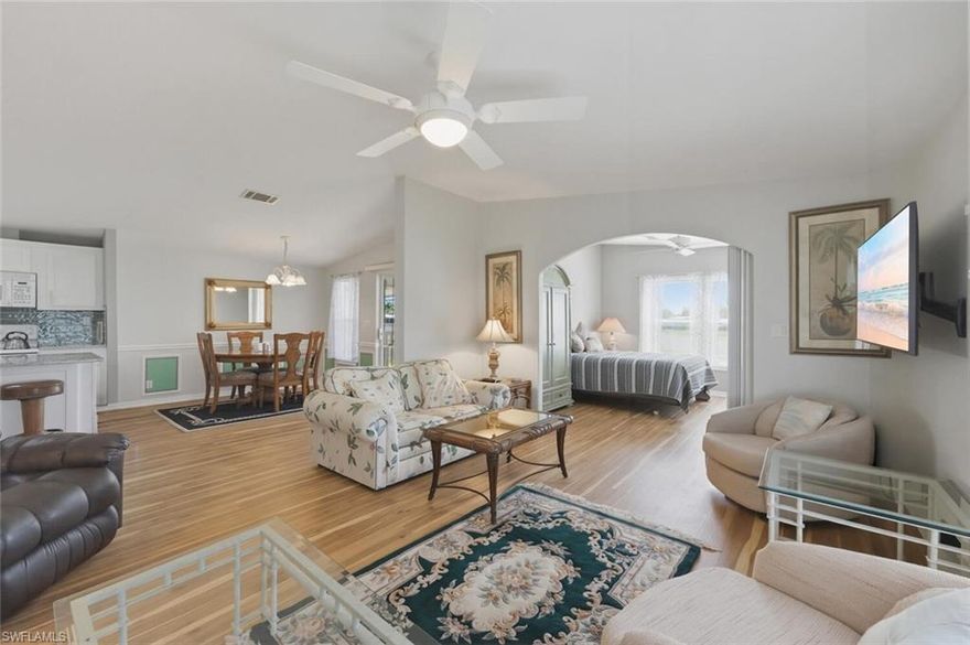 This spacious and meticulously maintained 2BR+DEN/2BA home, built in 2006, is one of the newest, and largest (1,452 s/f under air plus a 168 s/f screened lanai), in the community, and it is being sold TURNKEY! The home has vaulted ceilings (for a bright and open feel), newer vinyl plank flooring, wainscoting, high baseboards and chair rail, all of which add to the overall attractiveness of the home. Just some of the home’s many other features include updated kitchen cabinets, an island (provides extra counter space and storage), granite countertops, tile backsplash, new kitchen sink & faucet, walk-in closet in the MBR and dual sinks in the MBA. The house, which was constructed with 2”x6” studs (as opposed to 2”x4” studs) for added structural stability, has a newer roof (2023) and has storm shutters for added protection during inclement weather. The house has a shed for extra storage, and a large carport that provides multi-vehicle protection as well. Riviera Golf Estates is a quiet and friendly 55+ community located just a short drive from Downtown Naples and Gorgeous Beaches. Community amenities include a newer heated saltwater pool with lap lanes, tennis/pickleball/shuffleboard/bocce courts, exercise room, billiards room, library, and a large clubhouse where many fun social activities take place. In RGE you own the land, and the affordable HOA fee is only $144/mo. (incl. basic internet)! So, whether you are simply looking for an affordable place to escape those brutal winters up north, or a home to enjoy the year-round, your search is over!  Isn’t it time you own your own little piece of Paradise in beautiful Naples, FL?