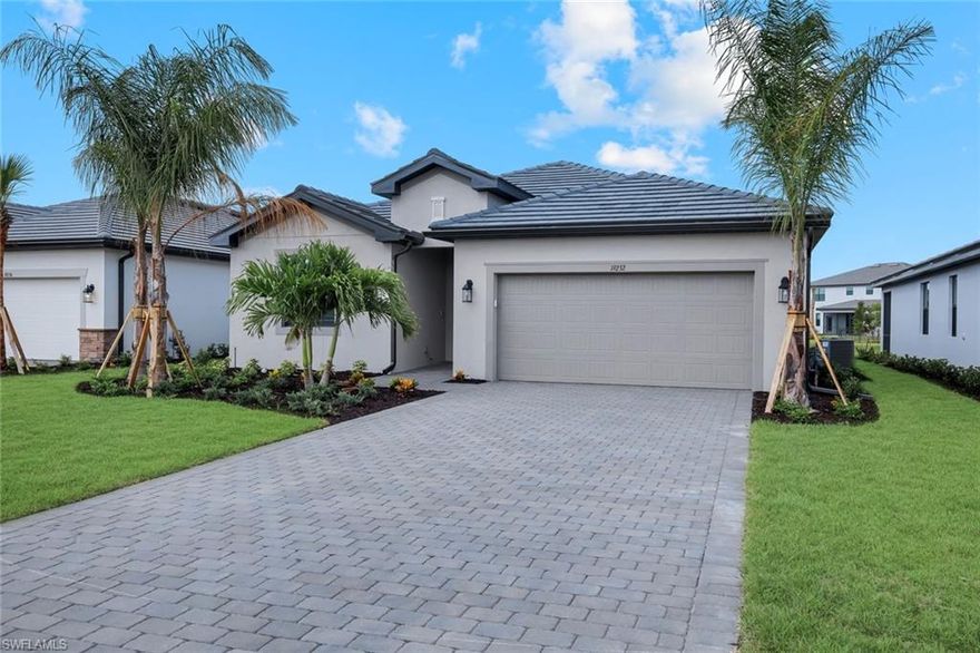 Why wait to build move in now. Experience elevated living in the highly sought-after community of Verdana Village, ideally located in the heart of Estero.
As you drive through the community, you will immediately notice the long, landscaped extended driveways, adding to the upscale feel while offering ample parking perfect for hosting gatherings with ease. 
This stunning Marsala model offers a spacious and thoughtfully designed open floor plan, perfect for both everyday living and entertaining. The heart of the home features a large kitchen island that seamlessly flows into the main living and dining areas ideal for hosting guests or enjoying quiet evenings at home with family.
Enjoy a peaceful lake view from your living space or enjoy a cool glass of iced tea while relaxing on your lanai, this is the essence of Southwest Florida living. The home includes 3 bedrooms, 3 bathrooms, plus a flexible den, providing ample space for guests, a home office, or additional bedroom.
Residents of Verdana Village enjoy access to one of Florida’s premier amenity centers featuring a resort-style pool and spa, fitness center, indoor and outdoor pickleball / tennis courts, a full indoor basketball court, and an on-site restaurant and social hub.
Just outside the front entrance there are The Shoppes at Verdana Village with Publix, Lagano Italian Kitchen, Dunkin Donuts, UPS store, Heartland Dental center, bank and more. All this just a golf cart ride away from your home.  
Conveniently located just minutes from Gulf Coast Town Center, Miromar Outlets, and Southwest Florida International Airport, as well as the beautiful beaches along the Gulf, this home offers the perfect blend of luxury, comfort, and convenience.  Schedule your private showing today.