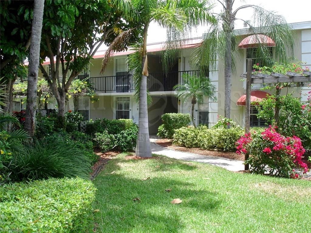 Photo of 2555 Tamiami TRL N #256, NAPLES, FL 34103 (MLS # 226000174)