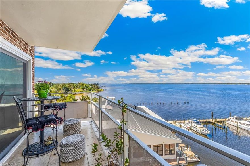 FIRST HARBOUR TOWERS - Perched high above the vibrant River District, this exceptional penthouse residence offers a refined blend of sophistication, comfort, and sweeping panoramic vistas of both the Caloosahatchee River and the dynamic downtown skyline. Featuring an abundance of natural light, the expansive open-concept floor plan is thoughtfully designed to maximize both space and scenery, creating an effortless flow between living, dining, and entertaining areas. Wide-plank porcelain flooring runs throughout, lending a sleek, modern aesthetic while complementing the residence’s elevated design. The gourmet kitchen is beautifully appointed with premium GE Café appliances, elegant quartz surfaces, and a reverse osmosis system servicing both the kitchen and icemaker—perfectly suited for both everyday living and entertaining at scale. Each bath mirrors this level of refinement, finished with luxurious quartz countertops and contemporary fixtures. Designed with both comfort and peace of mind in mind, the residence features hurricane impact windows and electric hurricane shutters, along with a newly installed air conditioning, a new hot water heater, and disposal—ensuring turnkey convenience. Residents will also appreciate the recent installation of a new building roof, assigned parking, private storage locker, a beautiful pool with amazing views of the river, adding to the ease of ownership. Offered with furniture negotiable, this penthouse presents a rare opportunity to enjoy an elevated, maintenance-conscious lifestyle in one of downtown’s most desirable waterfront addresses—where breathtaking views and modern luxury converge.