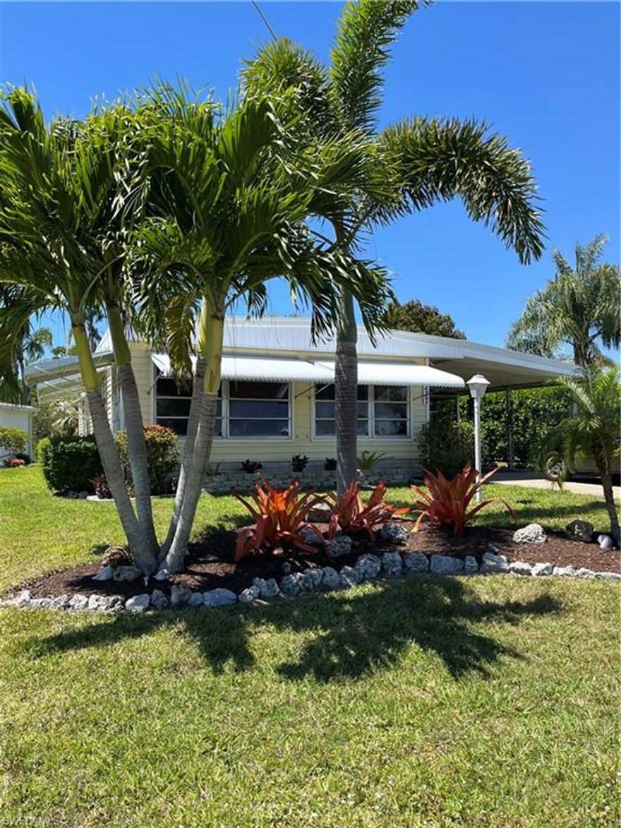 Welcome to your little piece of paradise! This home has been nicely updated throughout! Open concept. New lighting, new flooring and new roof in 2023! Relax in your backyard on your patio with palm trees and beautiful sunsets over the pond! A 55+ deed restricted community with voluntary membership available!