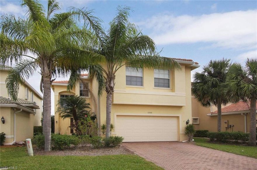 This Violet model 2 story, all concrete block home is well-maintained and located on a lake in the convenient Botanica Lakes neighborhood. With over 2400 sq. ft. under air, 4 bedrooms and 2 and a half bathrooms, this home is sure to meet all your needs. When entering this magnificent home, you’re in the open and spacious living area, which overlooks the lake. The home features a separate tiled living room and family room with plenty of windows to allow the natural light in. The kitchen is open to the family room which features granite countertops, stainless steel appliances and plenty of cabinets.  Just off the kitchen area is a tiled formal dining room. The master bedroom is separate from the other bedrooms. The windows in the master allow for viewing the lake. Master bathroom features dual vanities with granite countertops, a separate soaking tub and shower which aid in convenience and relaxation. The association fee covers 24/7 security guard at the gate, Wi-Fi, basic cable, alarm monitoring, lawn care, clubhouse with pool, spa and exercise room.  It is close to Gulf Coast Town Center boasting shopping and dining, RSW airport and both the Minnesota Twins and Rex Sox stadiums.