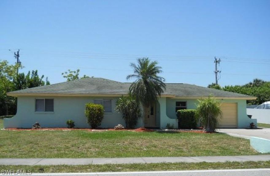 Great home for those just starting out or those looking to downsize. This house has 3 bedrooms, 2 baths and tons of living area. Nice back screened lanai with roof, new paint inside and out, new range, new flooring in bedrooms. Master bedroom has a large walk-in closet with built in shelving and the other closets have built ins as well. The roof is 8 years old so plenty of life there and the house itself is solid as a rock. Stop by to see it today.