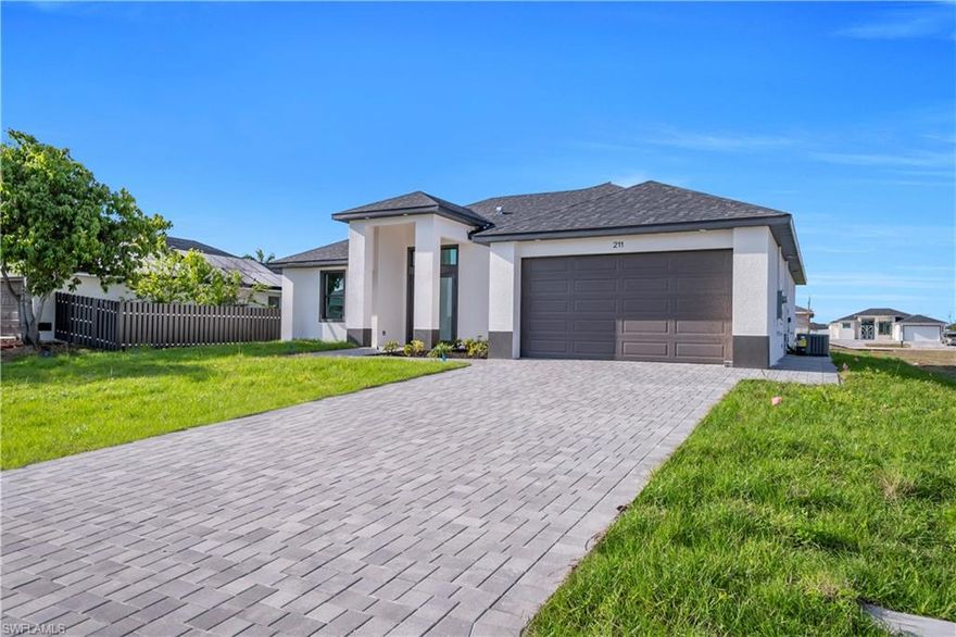 Welcome to this beautiful new construction home in the heart of Cape Coral! Centrally located and connected to city water and sewer, this move-in-ready property features 3 bedrooms and 2 bathrooms with nice, clean, modern finishes throughout. Situated in a non-flood zone area, this home offers peace of mind and convenience. Perfect for a primary residence or investment—ready for immediate occupancy. Photographs represent a previously completed residence of the same model, showcasing identical design, layout, and finishes. Variations, if any, are minimal.