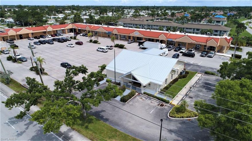 Owners motivated to sell 3,066 sf former bank branch on corner lot with full median cut just east of US 41 on Rattlesnake Hammock Rd!  Freestanding retail/office building with new metal roof and exterior paint is on outparcel to the Charlemagne Plaza which has had a facade renovation.