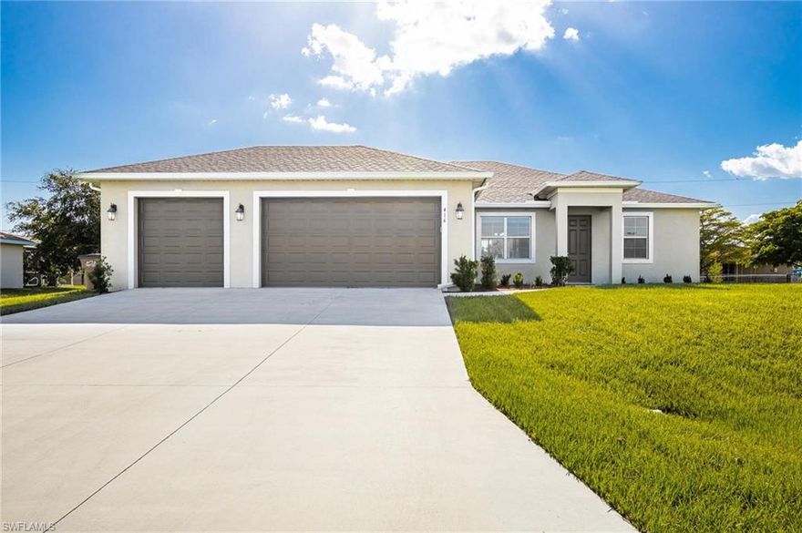 Come check out this BEAUTIFUL, like new 3-CAR GARAGE home featuring a split floor plan, 12' ceilings, with a beautiful tray and custom fan in the living area, a formal dining area, and large den with vinyl plank flooring and gorgeous glass french doors.  There are 8' doors through out, and a lovely triple panel slider that leads out to a large under truss lanai.  The master bedroom features walk in his and her closets, and the spacious master bath has double vanities, a large stand up shower, and water closet.  This home is situated on a TRIPLE LOT, with new landscaping, in a peaceful, yet convenient to everything- waterfront dining, shops, grocery, and more- neighborhood!