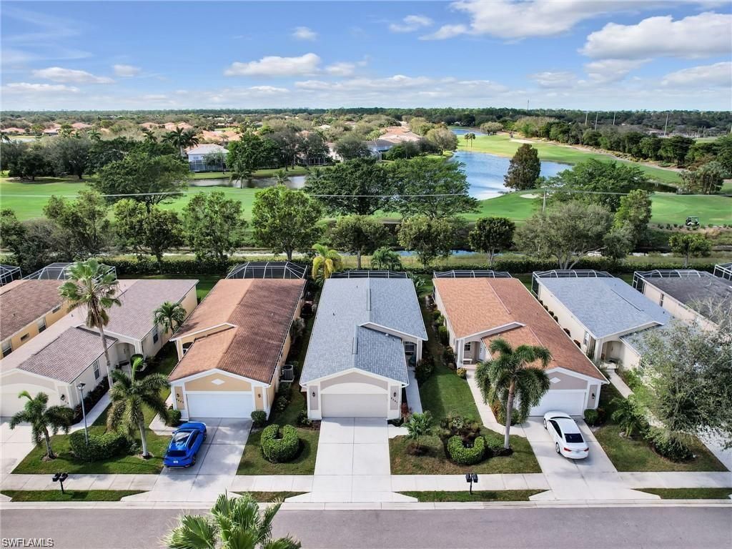 Photo of 8647 Ibis Cove CIR, NAPLES, FL 34119 (MLS # 226015654)
