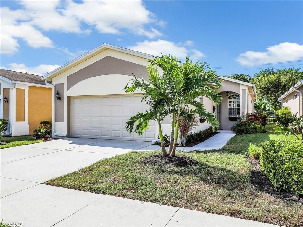 Photo of 8647 Ibis Cove CIR, NAPLES, FL 34119 (MLS # 226015654)