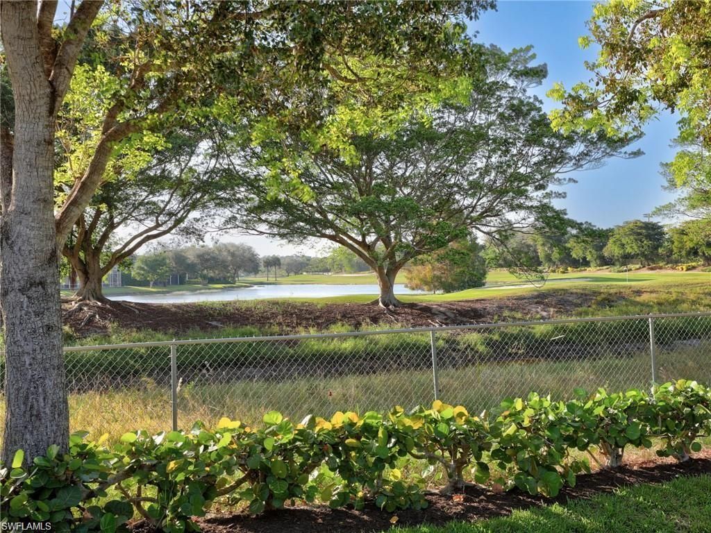 Photo of 8647 Ibis Cove CIR, NAPLES, FL 34119 (MLS # 226015654)