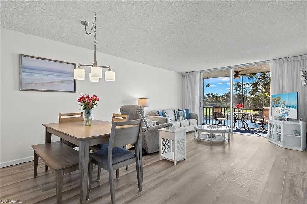 Photo of 200 Forest Lakes BLVD #204, NAPLES, FL 34105 (MLS # 225077866)