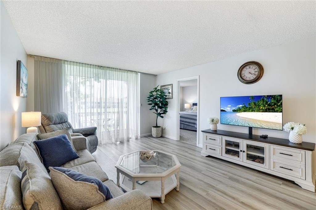 Photo of 200 Forest Lakes BLVD #204, NAPLES, FL 34105 (MLS # 225077866)