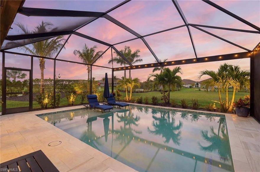 This Esplanade Lake Club villa is loaded with upgrades and offers a functional layout with 2 bedrooms, a den, 2 bathrooms, and 1,579 sq ft of living space, all with tile flooring throughout.
The open-concept kitchen and living areas flow directly to the outdoor space, featuring an 18’ x 22’ saltwater pool with a sun shelf and gas heater, covered lanai, outdoor kitchen with natural gas, and a fire pit—set up for both everyday use and entertaining. The covered lanai is also equipped with Storm Smart shutters, providing added protection and shade when needed. With western rear exposure, the backyard gets strong afternoon sun and sunset views. The home also includes a whole-house Generac 10kW generator and hurricane shutters along the rear for additional protection. Situated on a corner lot, it offers additional privacy and usable outdoor space.
Inside, the home is equipped with natural gas for cooking, and the garage includes four 8’ x 4’ overhead hanging storage racks for added organization.
Esplanade Lake Club is centered around Lake Como and features a lakeside clubhouse, resort-style pool and spa, fitness center, tennis, pickleball, and bocce courts, plus waterfront dining and a full-service bar. Residents also enjoy walking and biking trails, kayaking, and a full calendar of community events.
Located approximately 25 minutes to Southwest Florida’s Gulf beaches and just minutes from RSW Airport, Florida Gulf Coast University, and Gulf Coast Town Center, this location provides convenient access to shopping, dining, and entertainment.