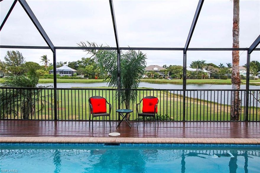 This is a remarkable property - beautifully landscaped, gorgeous golf course and lake views.  Master suite, guest bedroom (ensuite) plus two additional bedrooms, three (total) bathrooms, hardwood floors, family room featuring a fireplace, wet bar and wood paneled cathedral ceiling.  Remodeled kitchen with stainless steel appliances, elevated, caged pool, expansive covered lanai. Three car garage with plenty of storage, interior staircase and dumb waiter to kitchen, plus many more unique features.  Deeded beach pathway.