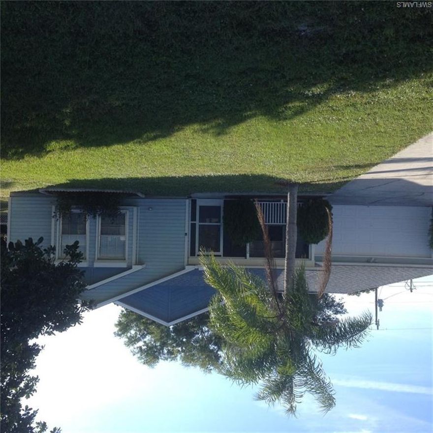 Come see this completely updated and remodeled 3 bedroom 2 bath pool home in centrally located SW Cape. So much has been done to it but to name some, new AC, new water heater, new stainless kitchen appliances, new washer/dryer, new fans, lights, vanities, faucets, sinks, carpet, blinds, completely painted and much more. Tiled main living area with carpet in 2 secondary bedrooms and wood laminate in master. Pool has been resurfaced, yard is fully fenced and mature landscaping has been trimmed and added to. Even garage and lanai concrete floors have been custom painted. While not a large home this house is ready to move in and has all the features of newer homes. Make your appointment to see this amazing house now, you won't find a better deal in all of Cape Coral.