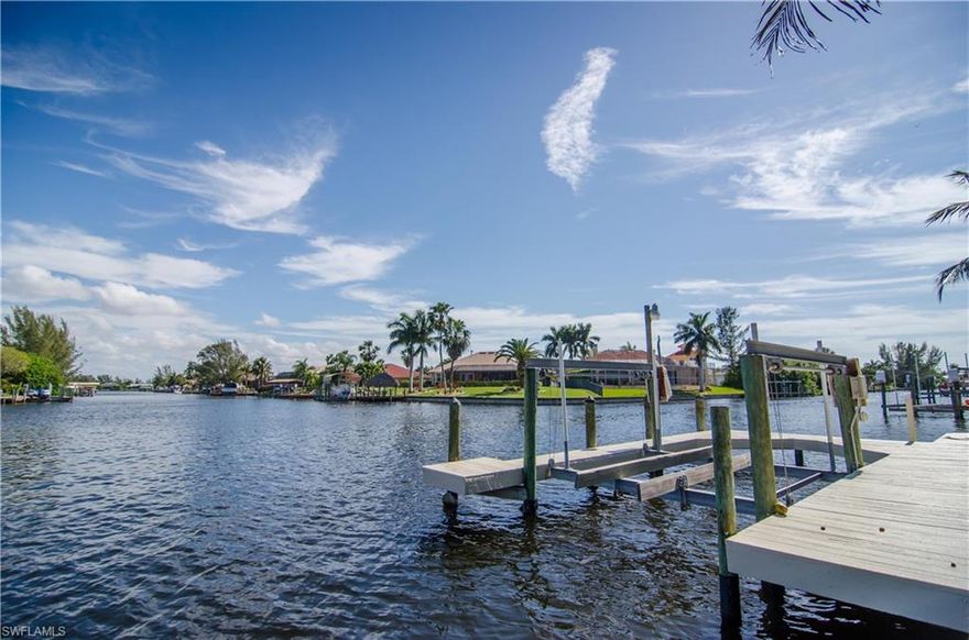Look no further, your dream home has arrived! Fantastic 2 story Gulf access pool home looking right down the barrel of a spectacular canal intersection. Over 2,900 sq. ft of living area with 3 bedrooms, 3 baths, office space, a folding room, and so much more. The great room has fantastic 20' ceilings, overlooks the pool area, features a fireplace, and has several skylights, which streams tons of natural light into the in the room and gives it a bright and airy feel. The kitchen has beautiful granite counters, custom appliances, and a pass-through to easily transfer food and drinks out to guests at the pool area. All of the bedrooms are located upstairs. The master bedroom has beautiful wood floors, his & hers closets, an additional master closet, and connects to the spa-like master bath, with an enclosed glass walk-in shower. Just outside the master bed is a HUGE second-floor balcony with breathtaking views down the canal and over the pool. There's also a spiral staircase down the balcony for easy pool access. Whether your enjoying the stunning outdoors or elegant interior, this home has too many upgrades and features to mention! See it for yourself and schedule your showing today!