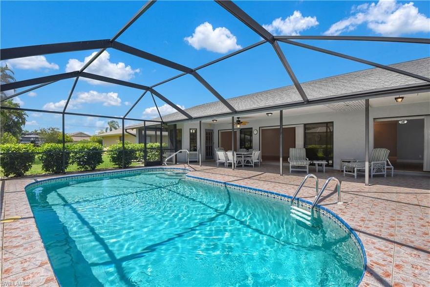 Beautiful home nestled in the popular Eight Lakes area of SW Cape Coral! This immaculate 3 bedroom home combines elegance & beauty with upscale finishes. Sophisticated master bedroom with spacious walk-in closet design. Remodeled master bath includes marble shower w/ shower tower and double Carrara marble vanity. Southern exposure with park-like landscaping and luscious foliage giving you privacy to enjoy your pristine remodeled pool bath. Custom kitchen equipped with granite and butcher block countertops, pantry, and all new stainless steel appliances (refrigerator, stove, dishwasher, microwave, and 32-bottle wine refrigerator). This home features new A/C unit, hot water heater, and indoor laundry room. New outdoor lighting plus fresh new paint inside and out. Just minutes away from Tarpon Point and Cape Harbor for dining, shopping, and easy access to grocery stores!