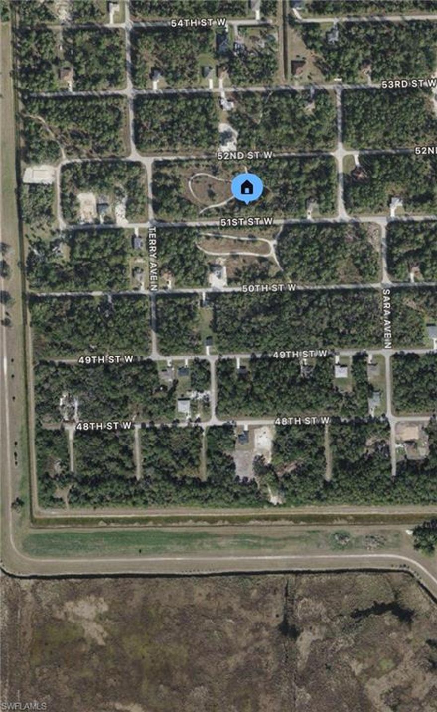 Side by side lots on a paved road in a rapidly developing sector of Lehigh Acres! Financing available. Perfect for a half acre or to build two side by side homes! Not much clearing required perfect for investment! Call today for more information! Hablo Español. LOW TAXES!!