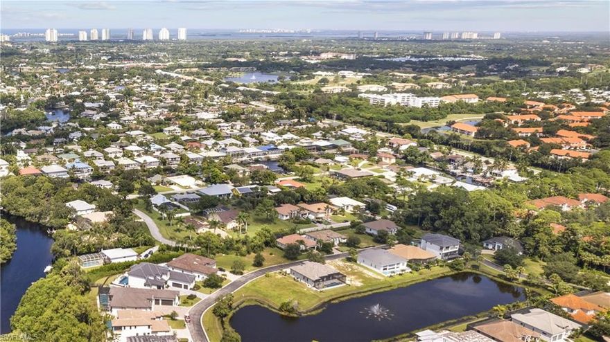 Build your dream home on a rarely available corner, lakefront lot!  Serrano is a quaint, gated community located near downtown Bonita Springs on the Imperial River. Enjoy easy access to beaches, golf courses, I-75, RSW airport, shopping and dining. Amenities include a community pool, clubhouse and even a boat launch area with kayak/paddleboard storage available.  Use your own plans or take advantage of the builder plans available. Don't wait - this beautiful lot won't last long!