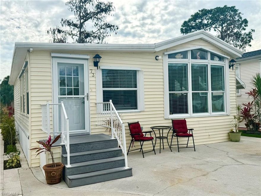 A beautifully maintained home with a tropical outdoor living space— Welcome to 73 Vanda Sanctuary! This lovely retreat is situated within the Imperial Wilderness Condominium Association of Naples, FL— a gated 55+ community where you also own the lot when you purchase the home (it is not leased land or a Co-Op). This truly charming 1Br/2Ba home offers luxury vinyl & ceramic flooring, ample storage space inside & out, rear patio pavers, a metal roof, dishwasher, full-size washer & dryer, newer living room furniture, several updates in the bathrooms, and is being sold furnished. The abundance of windows allows natural light to flow through the home while the clam shell shades provide sun protection. The vibe of a home truly makes all the difference; this home is pleasing from the moment you step in the door. From there, you’ll notice that the sense of goodness continues as the color pallet and decorating scheme are consistent throughout the entire space. Additionally, IWCA is brilliantly located. It is approximately 3 miles to shopping and restaurants, 11 miles to the Naples beaches, and 8 miles to the Marco Island beaches. Airport access is easily attainable— a 45-minute drive (RSW). Maximizing the opportunity to affordably own in Naples, FL, the HOA fee of $898. per quarter is exceptionally reasonable. That fee covers many of your needs: the safety of a gated community, water, sewer, lawn care, basic cable, trash, recycling, and community amenities. Community amenities include 2 pools with spas, bocce, pickleball, pétanque, tennis, shuffleboard, billiards, ping pong, a library, clubhouse, 2 dog parks (1 pet, 40lb. max.), nature trail, and an extremely active events calendar— there are over 100 activities available per week! If you are looking for fun or a chance to relax in paradise, this is for you!