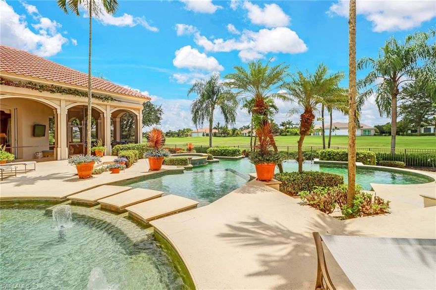 This elegant estate home was custom built by Gulfshore Homes and has over 6, 900 sq.ft. of air-conditioned space. GOLF CART & GOLF MEMBERSHIP INCLUDED W/ASSESSMENT PAID. Situated on nearly an acre with a wide golf course view, this home boasts 5 ensuite bedrooms and 7-1/2 baths. Upon entering the home the tall oversized windows in the formal living room offer lots of natural light in the living/dining area. A gracious curved stairway heads up to a sitting area and two separate guest bedrooms. A separate stairway on the other side of the house leads up to the 5th bedroom with a comfortable living area and additional kitchen. Downstairs, a gourmet kitchen and generous family room with a built-in bar open up to a large screened-in lanai area built for entertaining. The infinity-edge pool, jacuzzi and fountains are all open areas in order to enjoy the sun. This home offers 3 dishwashers, 2 morning bars, an outdoor kitchen with built-in grill, 5 icemakers, 5 refrigerators, golf cart garage, and a home office with fireplace and built-in cabinets.