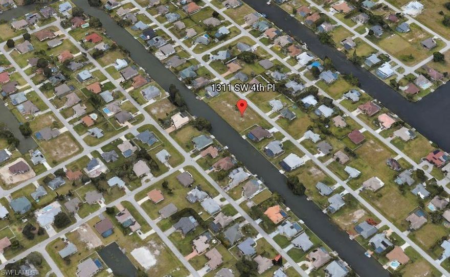 WATERFRONT/FRESHWATER CANAL SITE WITH SEAWALL, City water and utilities! This is the perfect home site for the water enthusiast! This cleared TRIPLE lot is ready for your custom dream home. This lot is Located on the 100' wide Bristol Canal, with direct access to Alhambra Lake!  From your back yard you can take a boat ride, kayak, paddle board or go fishing! Enjoy the adventures and waterways that Cape Coral has to offer. The SEAWALL was installed in 2014.  It doesn't get any better than this! Easy access to shopping, schools, restaurants, & centrally located in the heart of Cape Coral.  And close to the World Class Beaches of SW Florida. This opportunity will not last long.