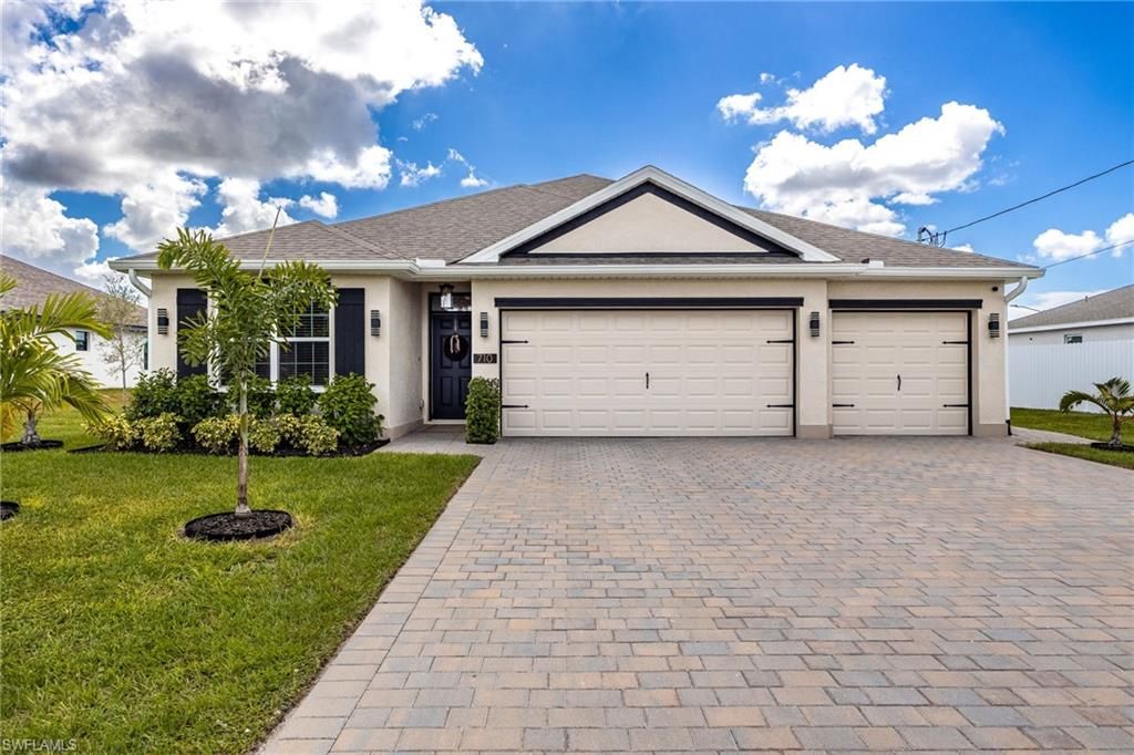 Photo of 710 SW 15th ST, CAPE CORAL, FL 33991 (MLS # 2025017625)