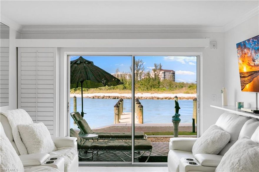 SUNSETS GALORE ON THE GULF!! Experience the pinnacle of coastal sophistication with this exquisitely reimagined residence at Ville de Marco West. Perfectly positioned to capture breathtaking sunsets over the Gulf, this elegant two-bedroom, two-bath condominium seamlessly blends European-inspired design with modern refinement. Every inch of this condo has been meticulously curated. A full renovation introduces brand-new, state-of-the-art appliances, including a private washer and dryer, ensuring the utmost in comfort and convenience. The bathrooms showcase a timeless European aesthetic, featuring Euro-style fixtures, refined finishes, and artfully tiled walls and floors. Plantation shutters grace the new impact windows and sliding door for a flawless presentation. For complete peace of mind, Flood Manager mitigation barrier panels safeguard the residence during inclement weather, while a deeded covered parking space adds both security and exclusivity. Step onto the west-facing end-unit patio to enjoy sweeping water views, enhanced privacy, and spectacular sunsets. A perfect backdrop for both intimate evenings and entertaining family and friends. Just moments from acclaimed restaurants, boutique shopping, galleries, cultural attractions, and the beach, this rare offering invites you to embrace an unparalleled lifestyle defined by elegance, tranquility, and natural beauty. An outstanding opportunity to live in a truly remarkable waterfront retreat.